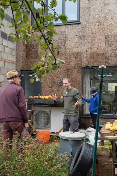 Paul Kershaw and others during the installation of the cork board. Lambertian Architectural Photography.